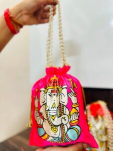 colourful potli in ganesh print